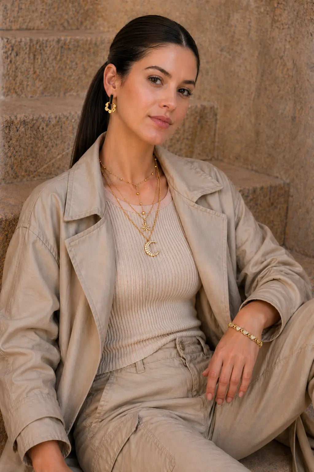 Dione Canada Best Seller poster featuring a rose-gold heart pendant necklace and a sterling silver infinity bracelet on a minimal luxury background