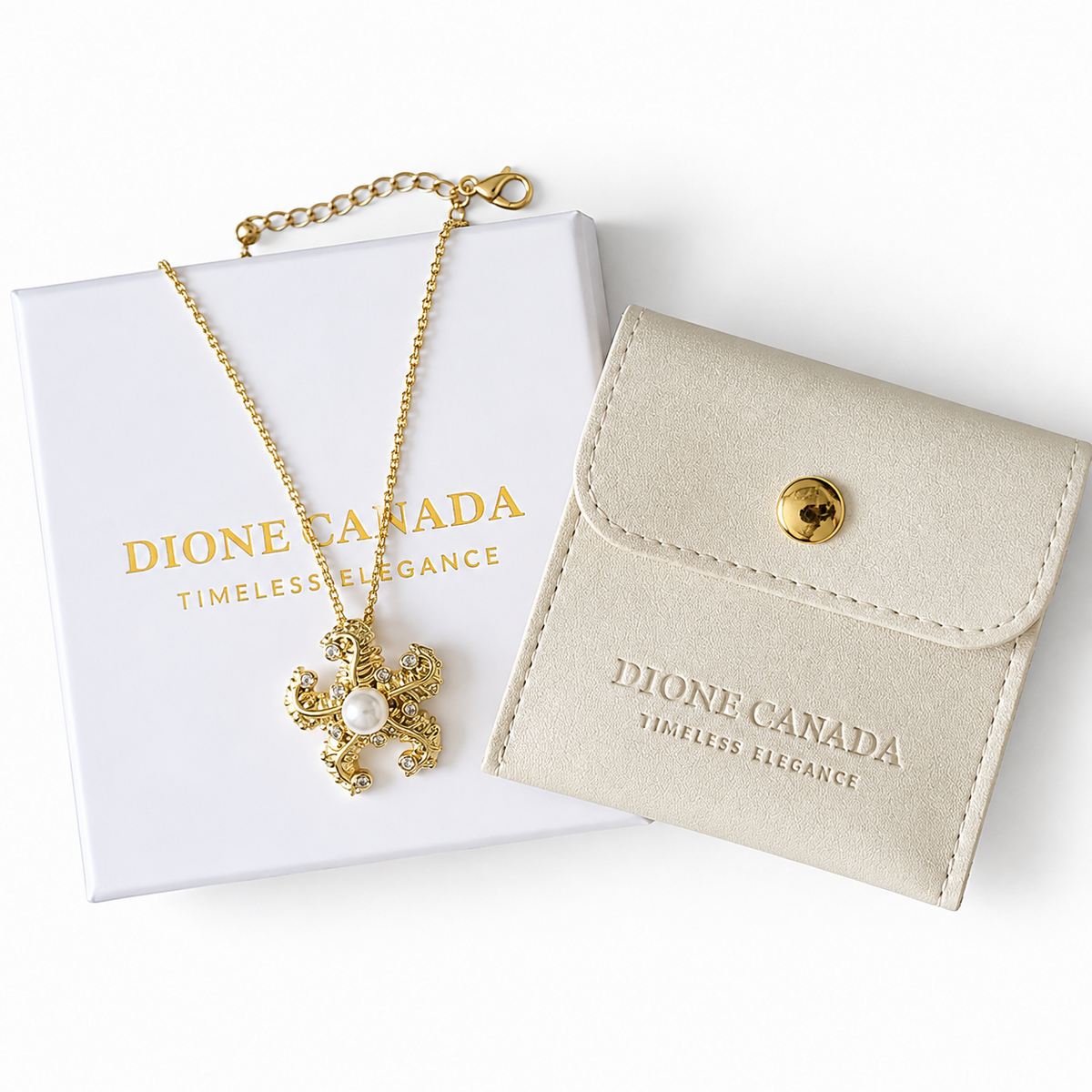 A gold-toned necklace with a floral pendant and a white pearl, displayed with its white Dione Canada box and a matching beige jewelry pouch on a clean white background.