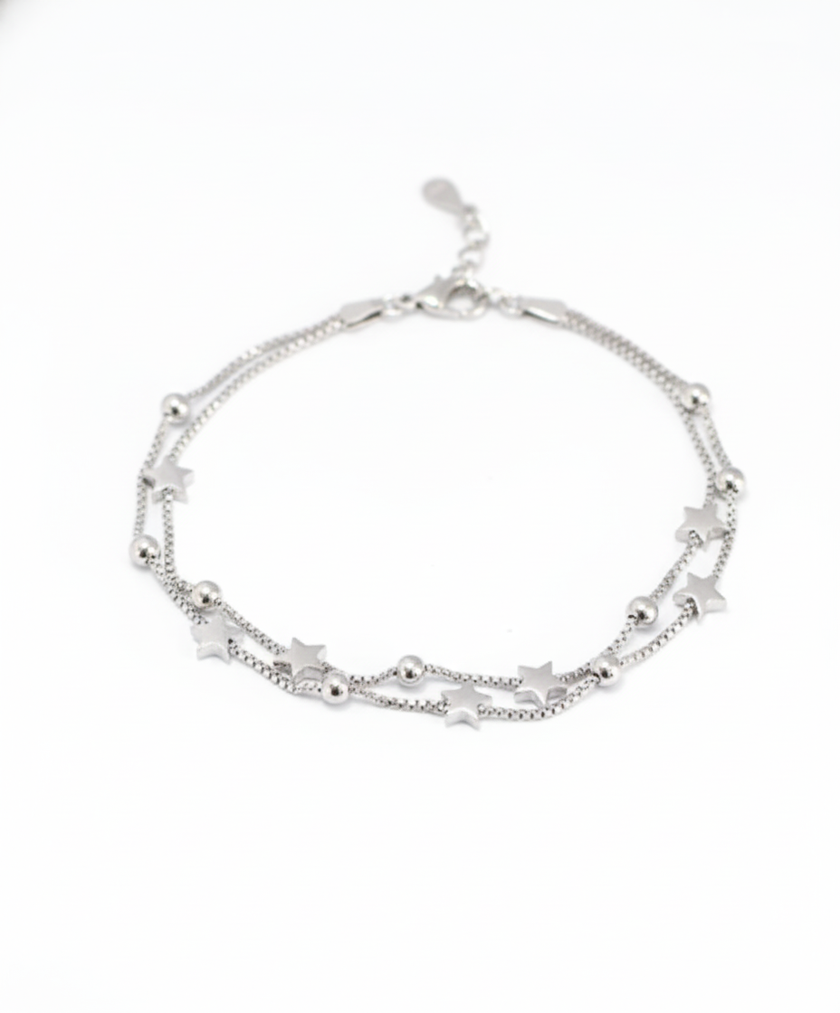 Astra Bracelet crafted from S925 sterling silver featuring a double-layer adjustable chain with delicate star beads by Dione Canada