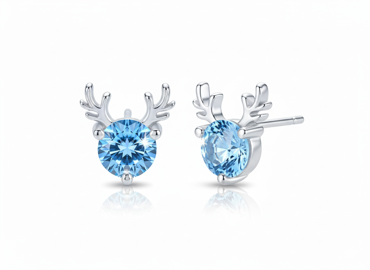 Aurora Frost Earrings in high-quality S999 silver with platinum-like finish and sky-blue gemstone, reindeer antler styled design by Dione Canada