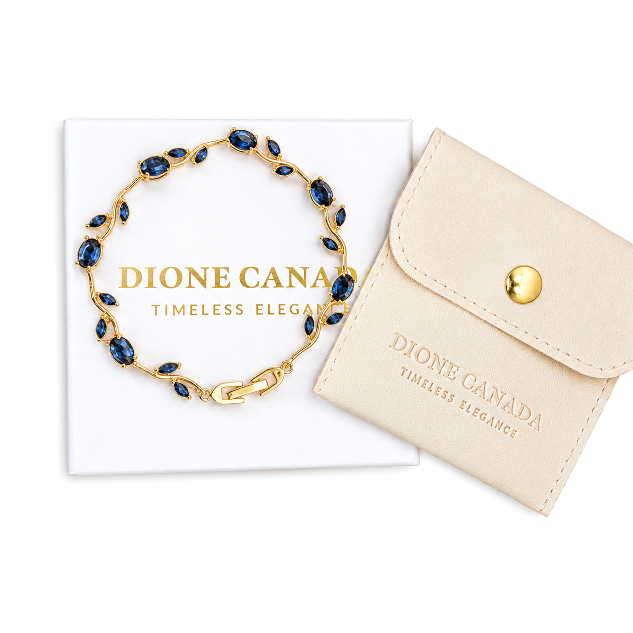 Gold vine-link bracelet with blue rhinestones, shown with Dione Canada's Timeless Elegance gift box and pouch