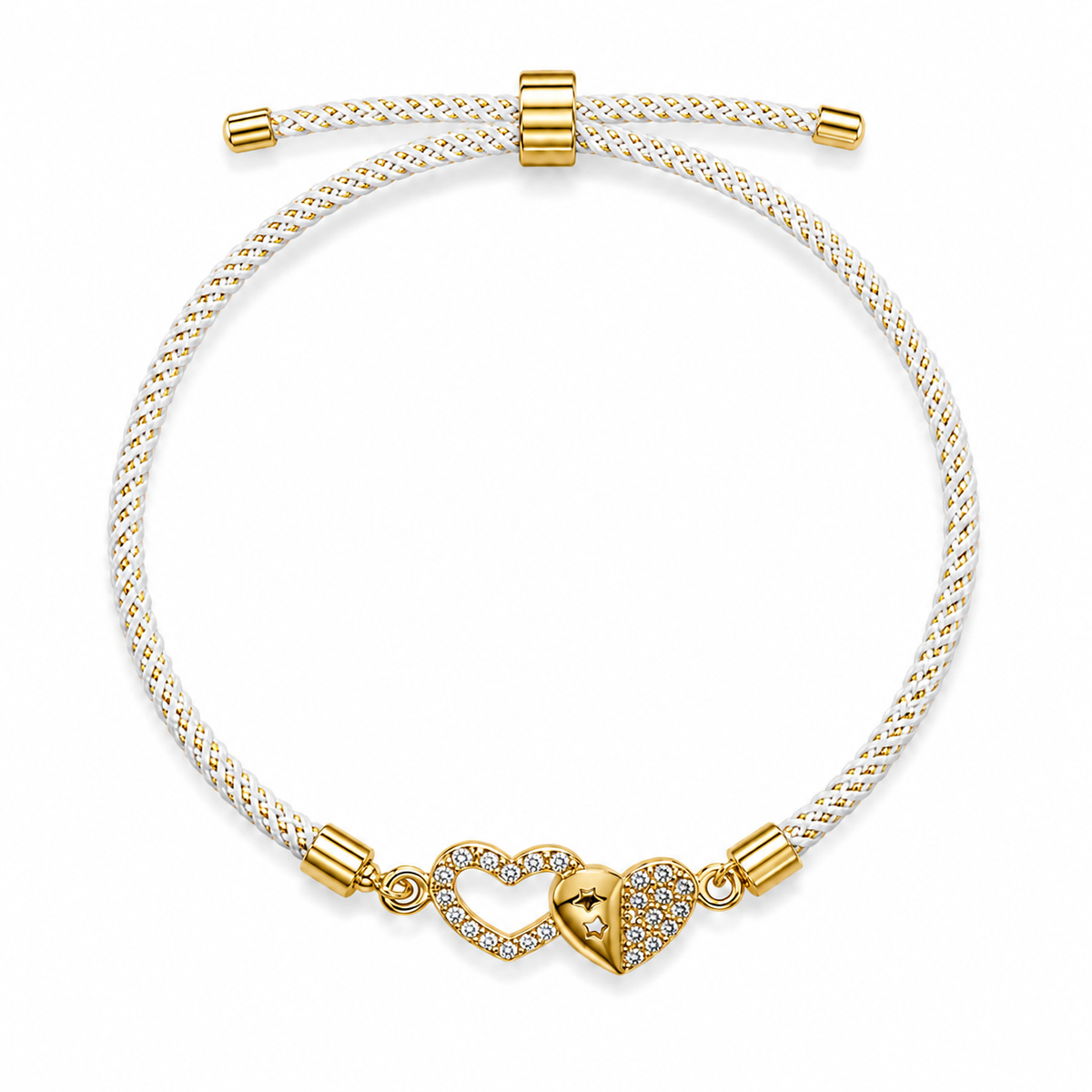 A gold and white braided rope bracelet with a heart-shaped charm paved with clear stones and featuring a central gold heart with an engraved face, shown on a plain white background.