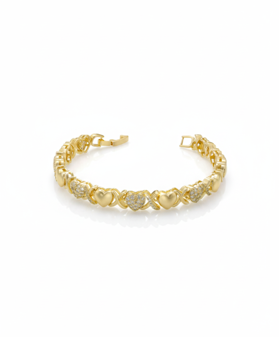 Diamond Heart Bracelet crafted from copper with 18K gold plating and zircon-studded alternating heart links by Dione Canada