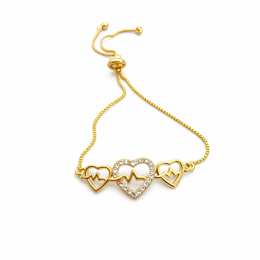 Dione Canada gold heartbeat heart bracelet with crystal-accent center heart on adjustable chain
