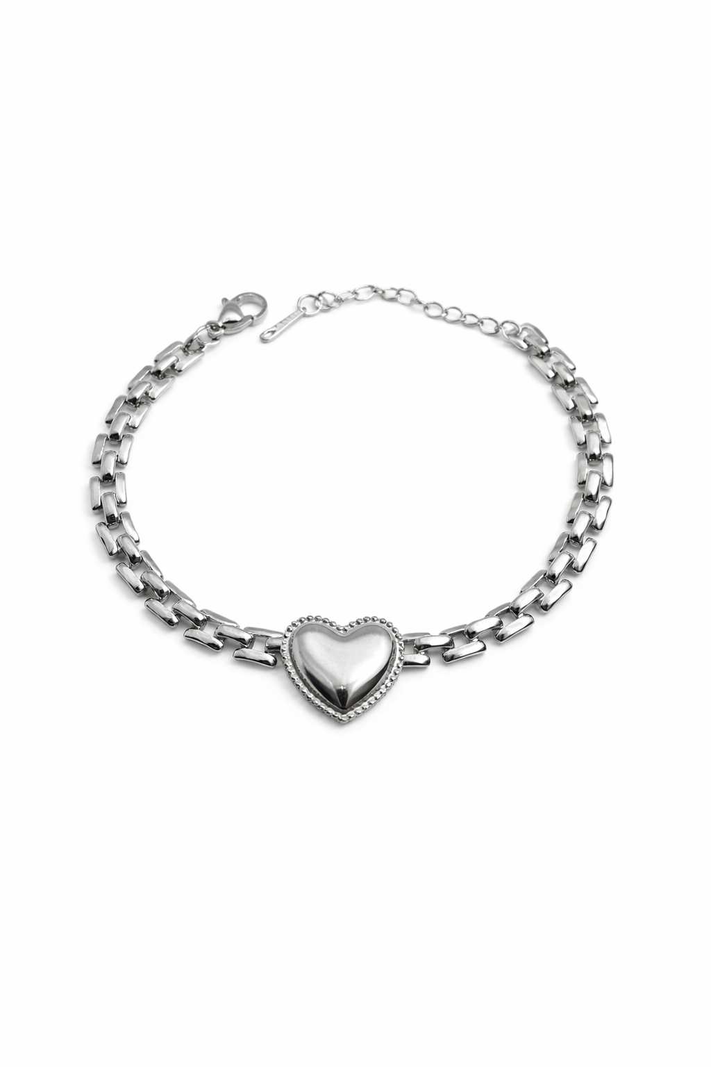 Dione Canada silver heart chain bracelet with polished heart centerpiece on a linked chain
