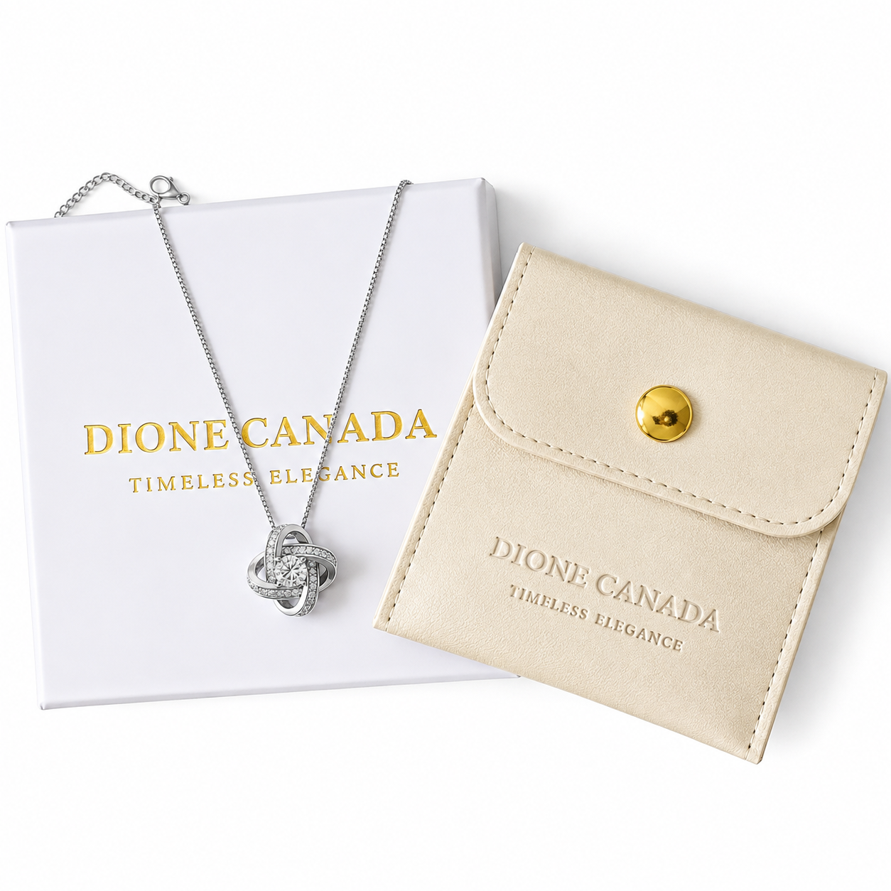 Dione Canada diamond necklace with a silver-toned four-leaf clover pendant, displayed with its white presentation box and a beige faux-leather pouch on a white background.