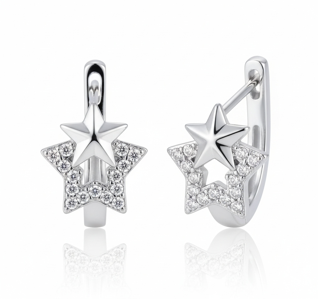 “Dione Canada silver star hoop earrings featuring a polished star motif with shimmering crystal detailing, shown in a clean luxury studio close-up.
