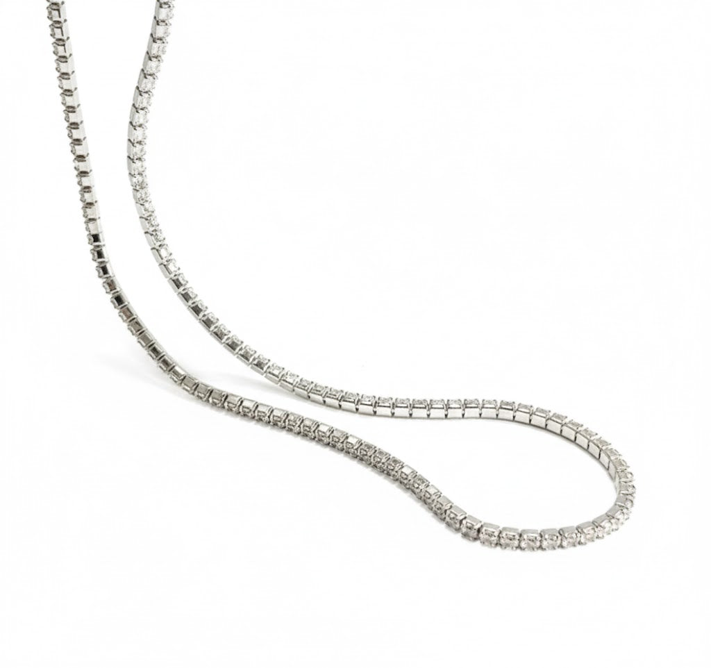 Silver chain necklace on a white background