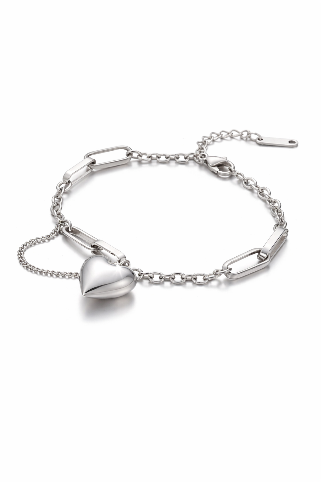 Silver bracelet with heart charm on a white background