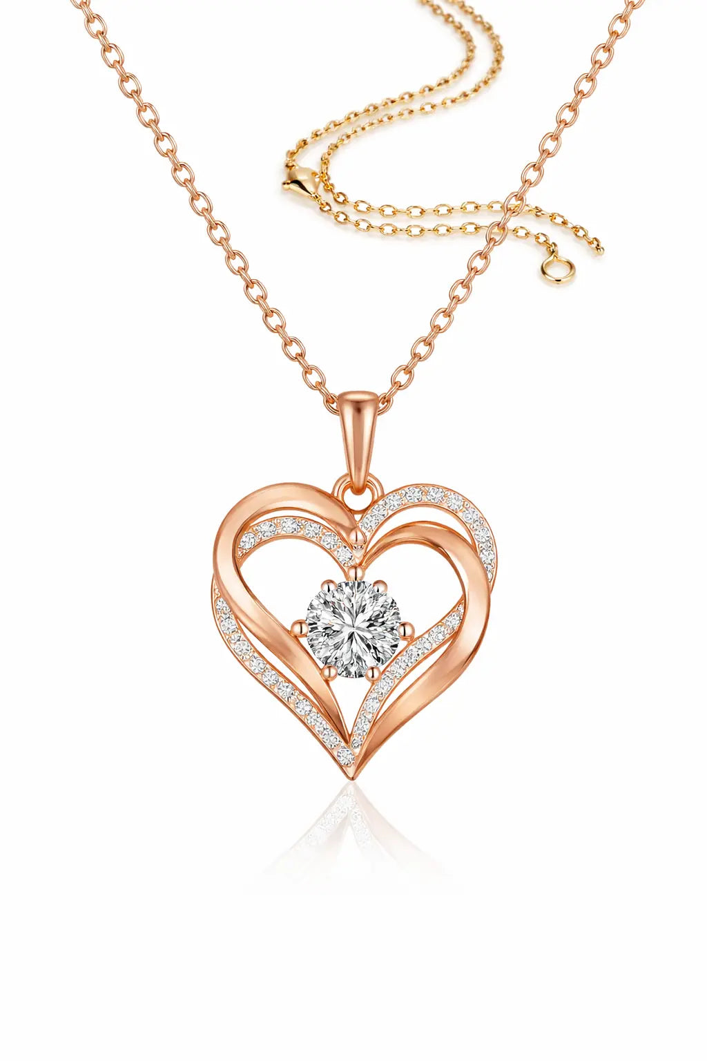 Rose gold heart-shaped necklace with a diamond on a white background