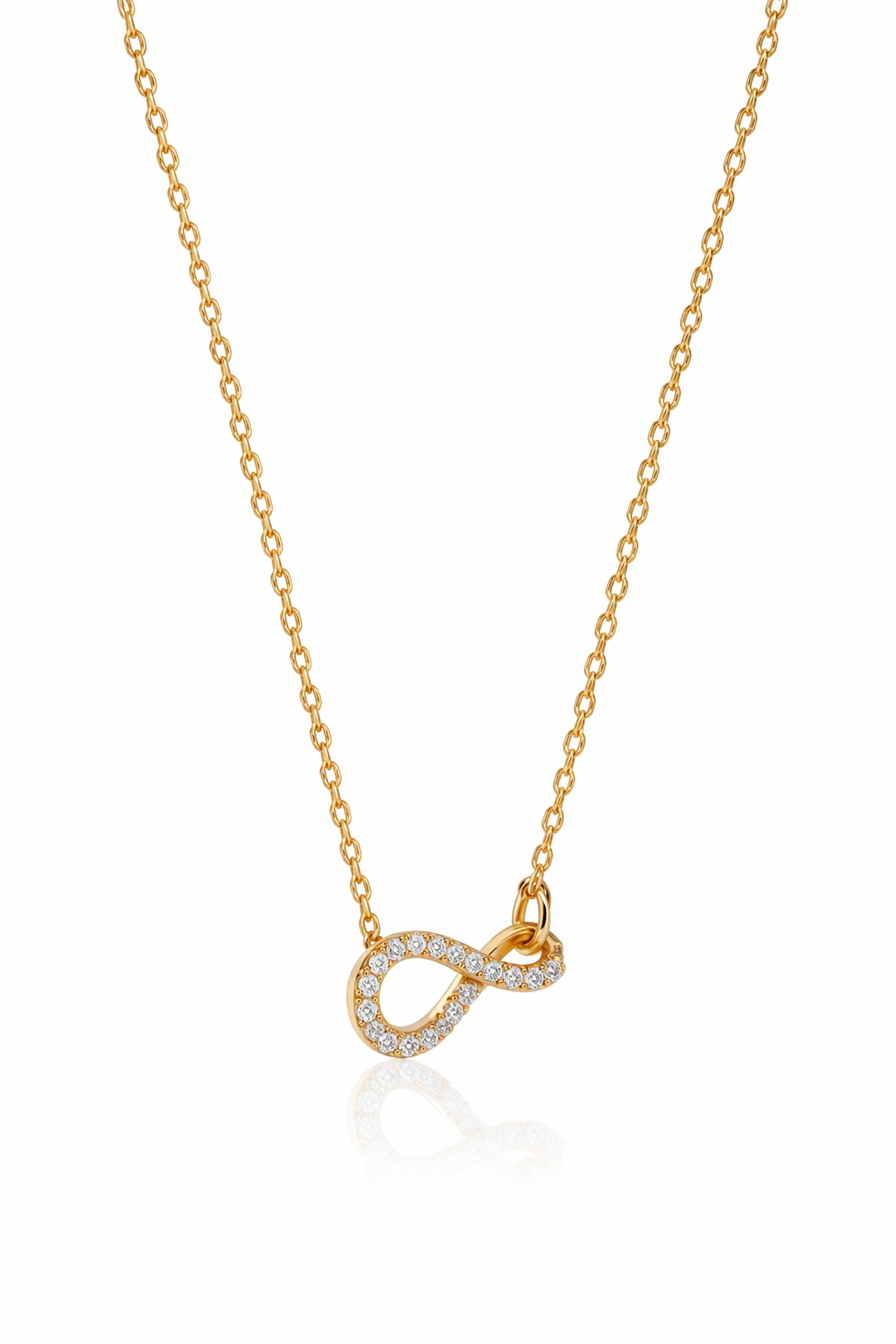 Gold necklace with a diamond infinity pendant on a white background