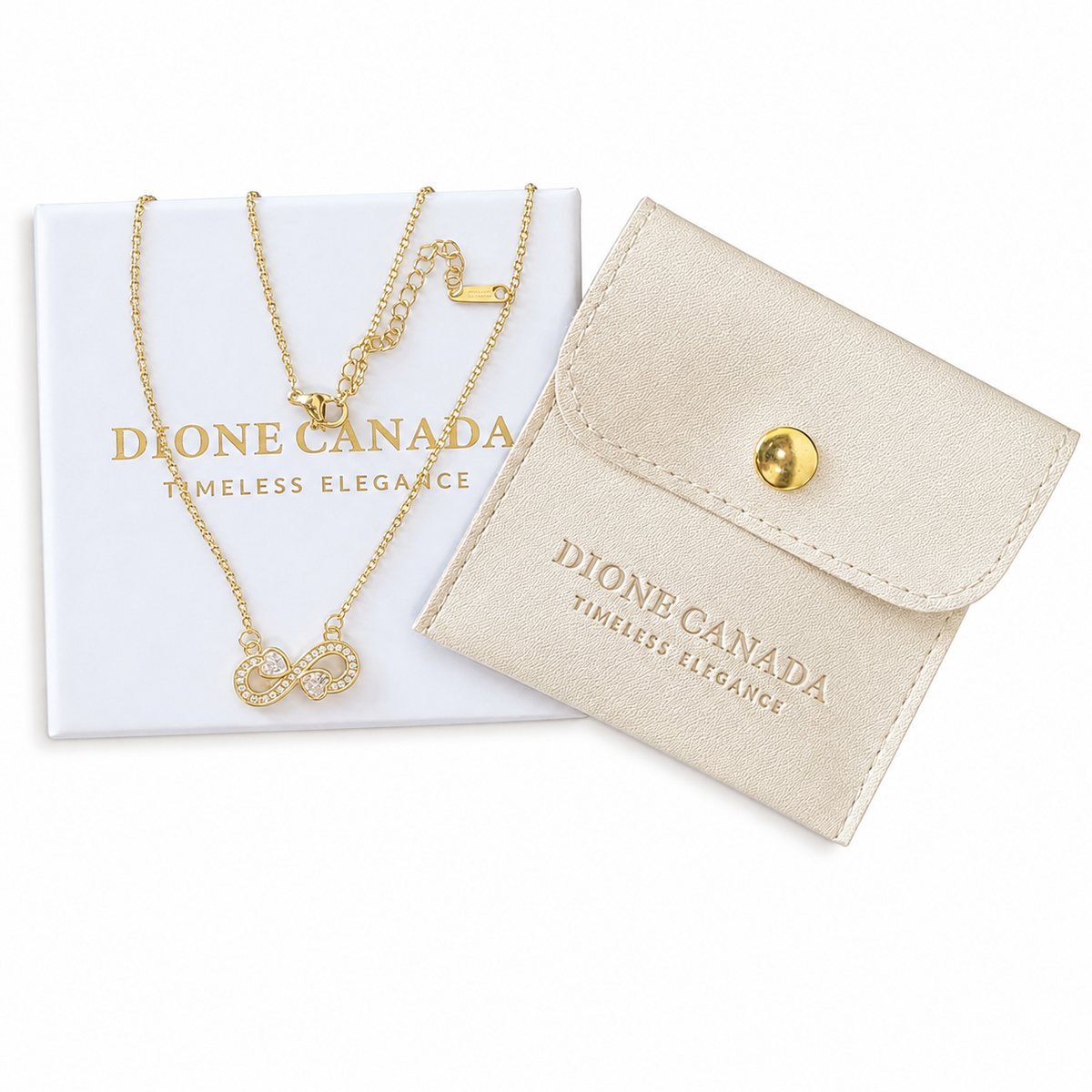 Gold infinity heart pendant necklace with pavé crystals, shown with Dione Canada's Timeless Elegance gift box and pouch