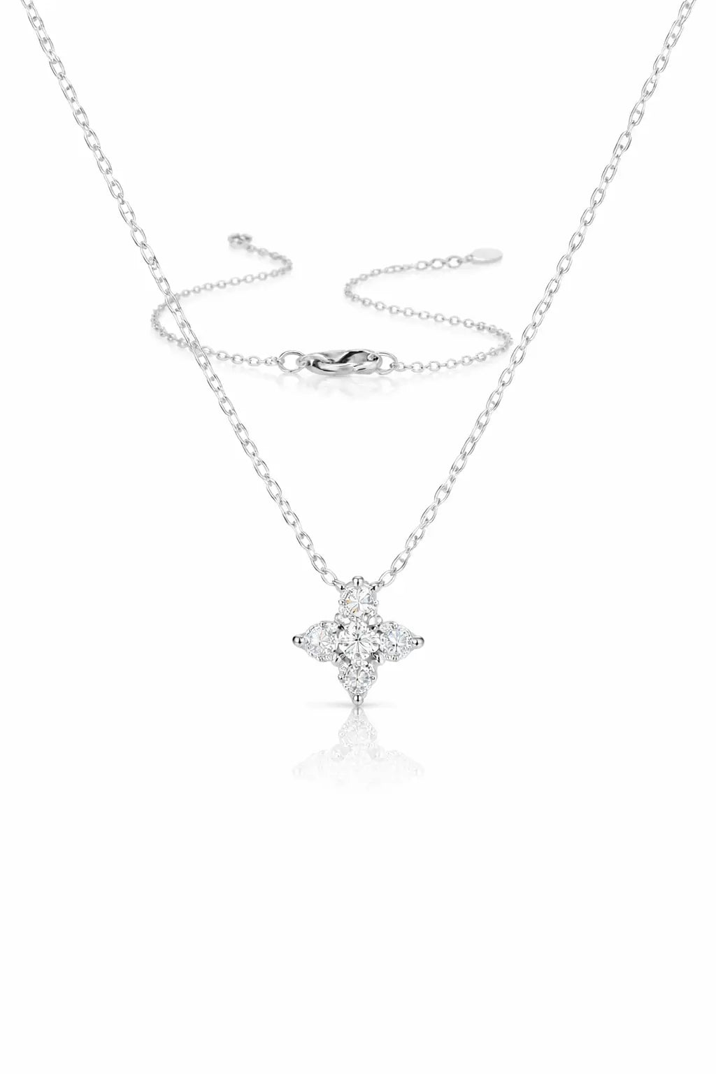 Silver necklace with a star-shaped pendant on a white background