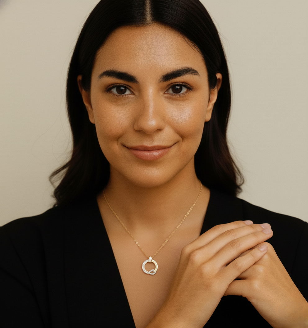 Model wearing Harmony Circles Necklace – minimalist gold-plated copper pendant with interlocking circles by Dione Canada