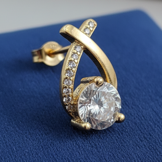 Model wearing Nova Stud Earrings – minimalist geometric studs in dual finish gold and rhodium plated silver crafted by Dione Canada