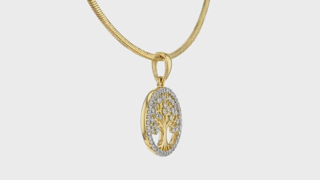 “Gold Tree of Life pendant necklace by Dione Canada featuring crystal-accent detailing and a polished oval frame, shown in a clean luxury studio close-up.