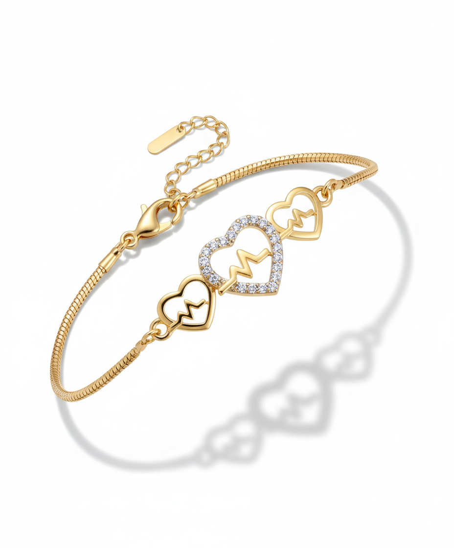 Pulse of Love Bracelet in 18K gold-plated copper featuring heartbeat and heart motif with zircon inlays by Dione Canada