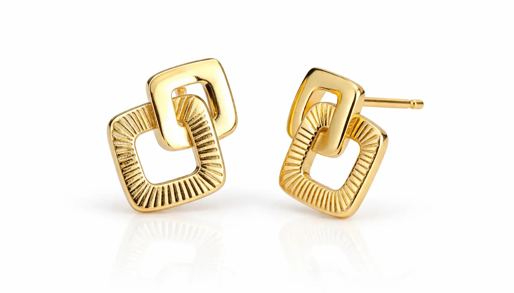 Gold earrings with geometric design on a white background